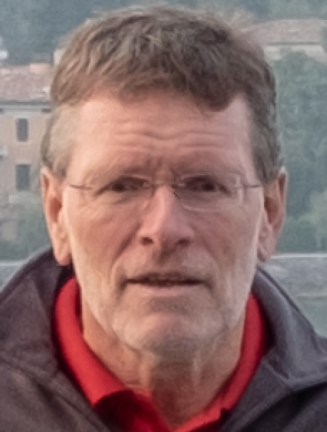 headshot of Professor Luscher