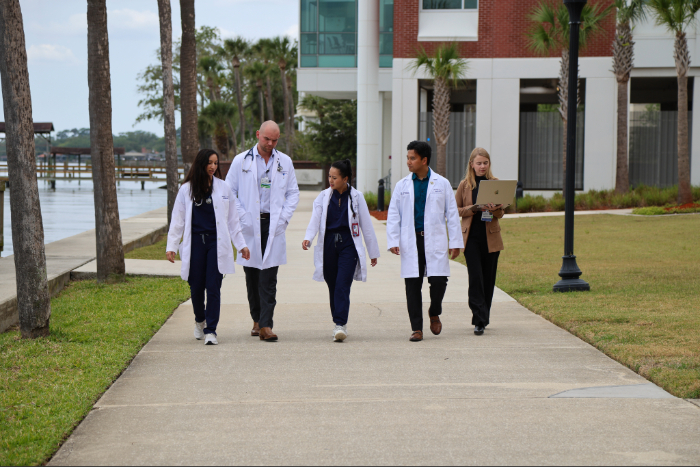 Residents enjoy a walk outside