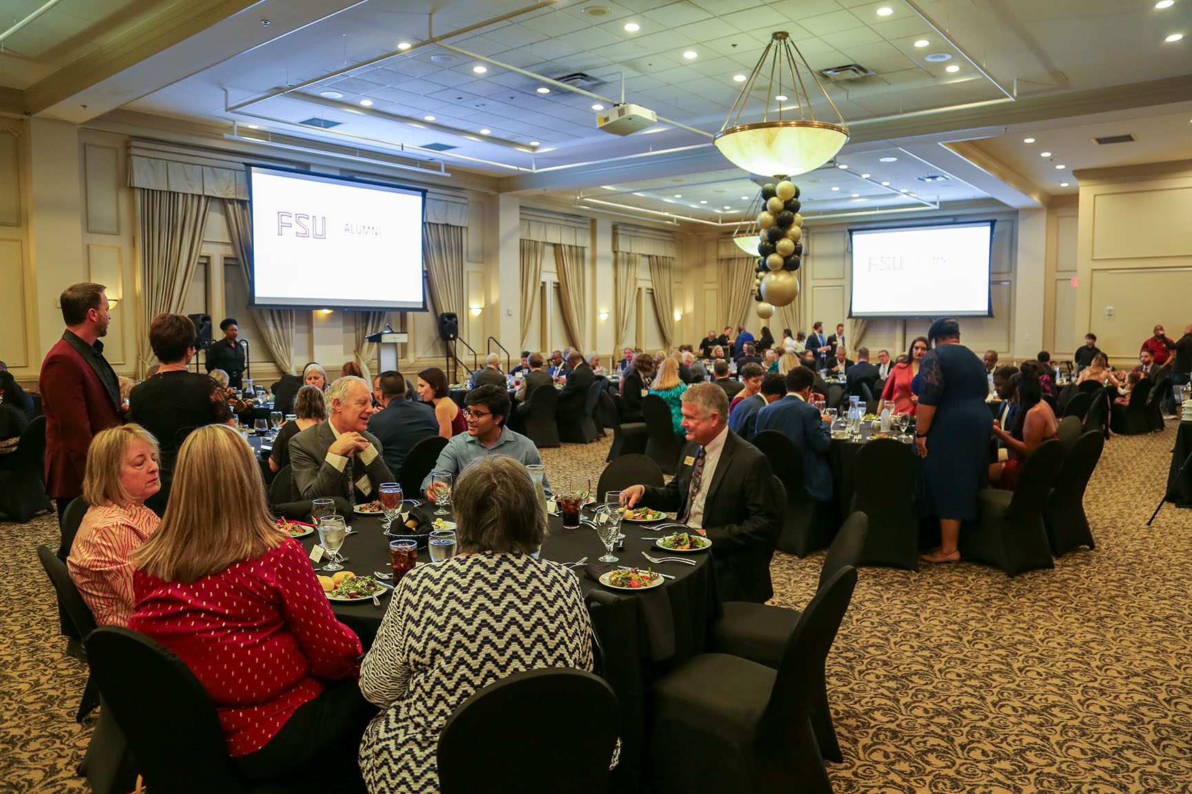 Ballroom full of Alumni Weekend 2025 attendees.