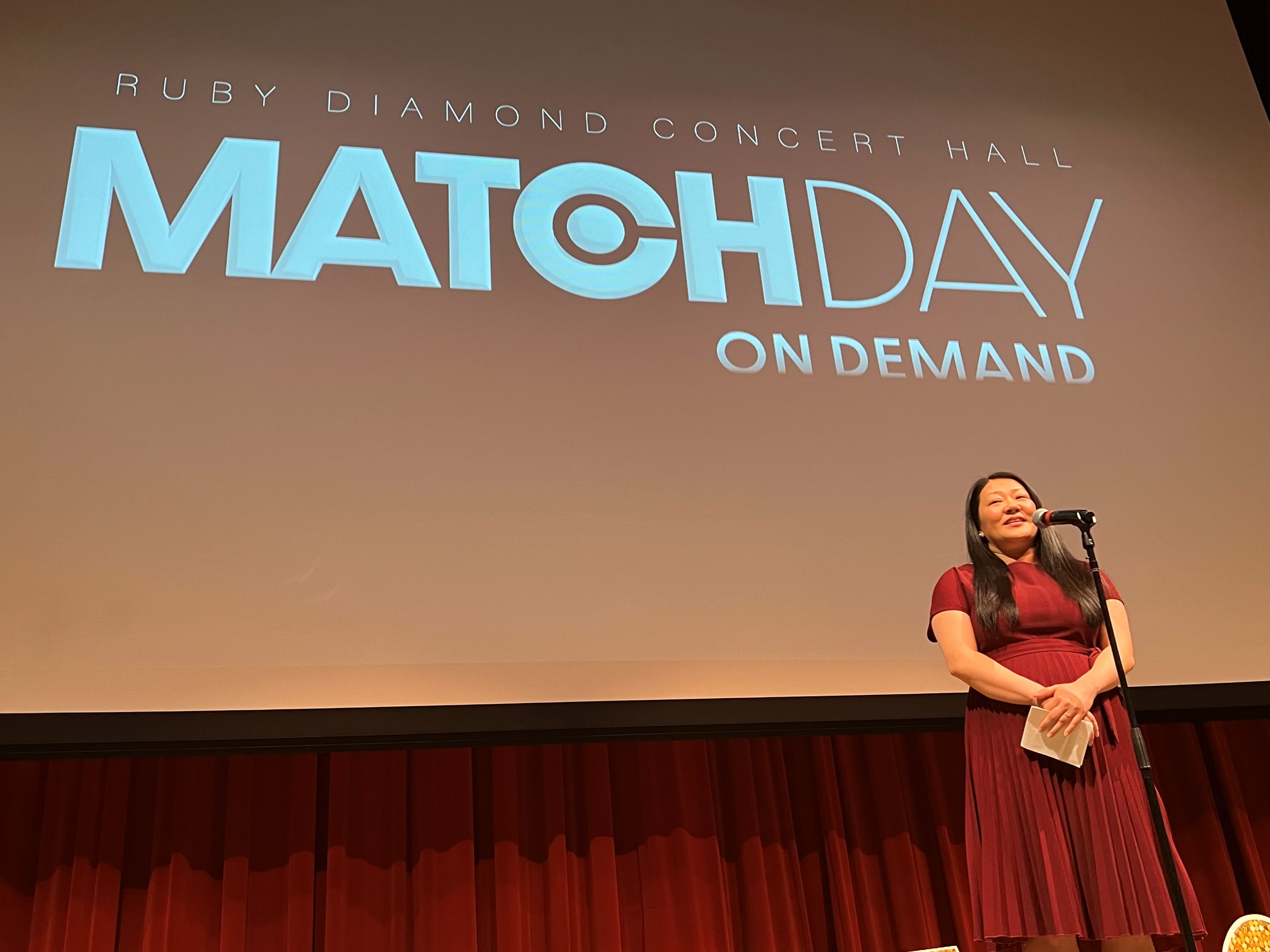 Alycia "Aly" Savage, president of the M.D. Class of 2026, addresses the Match Day crowd.