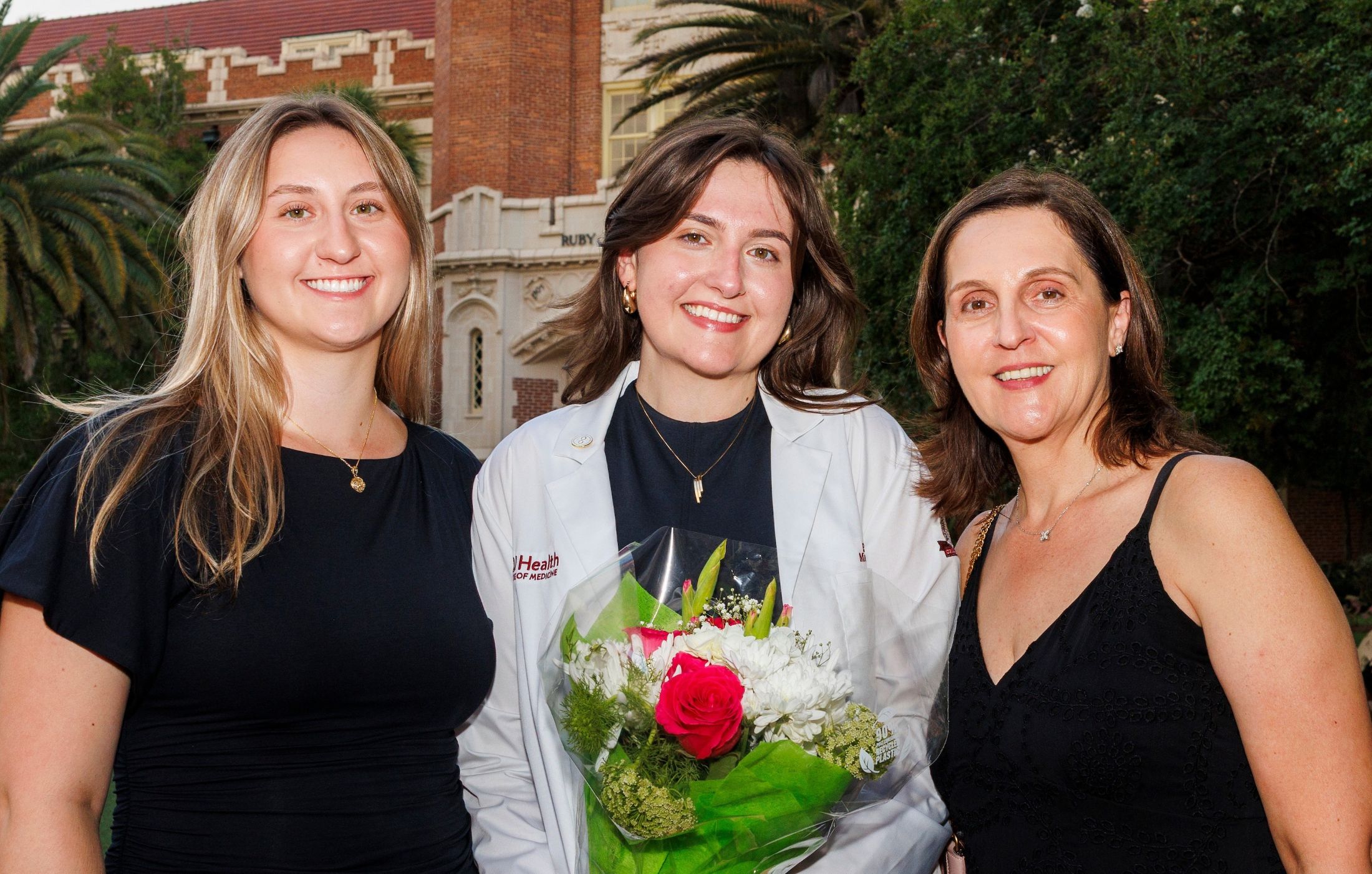 Emma Chirila, center, with sister Diana, left, and mom Andreea, right.