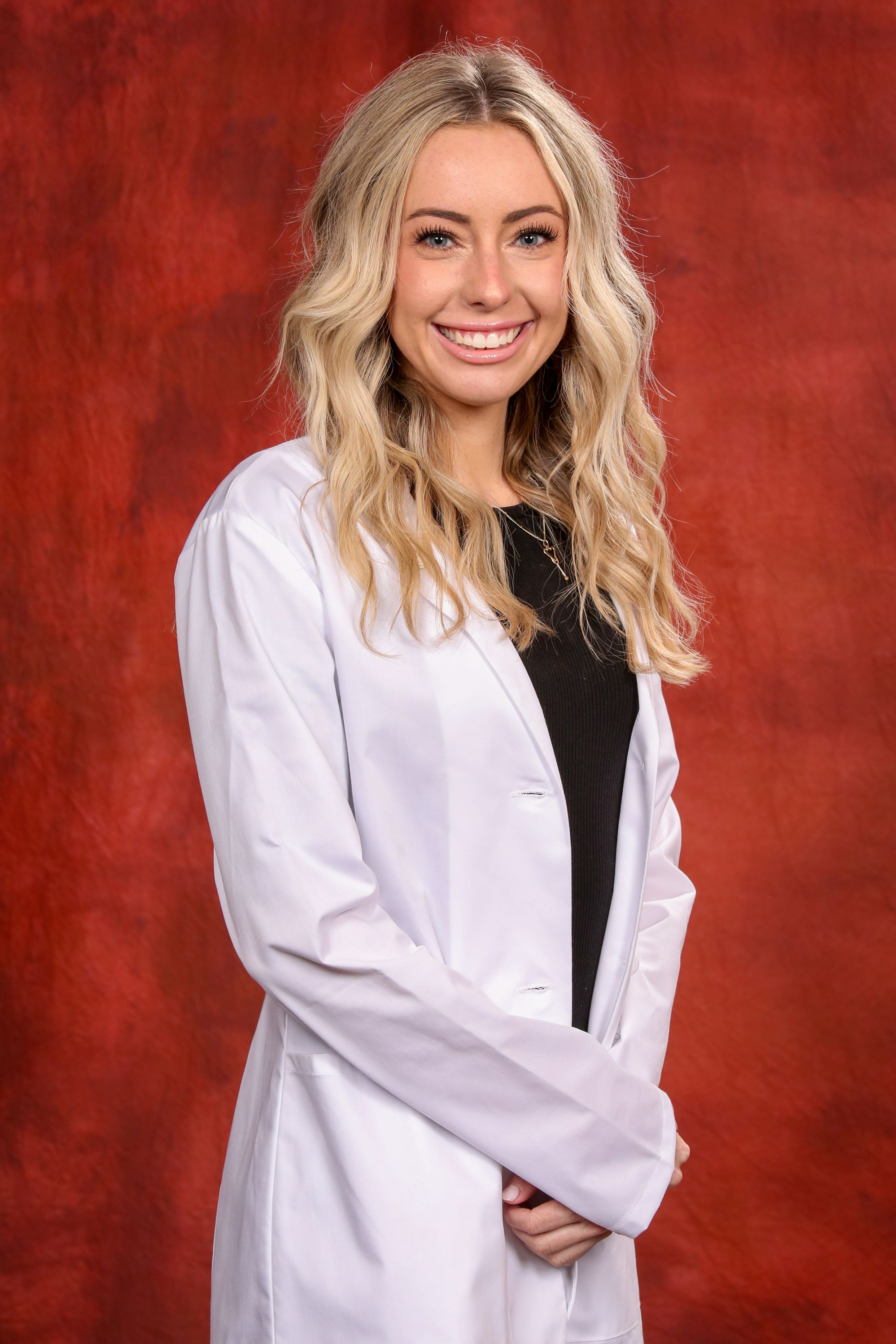 Madison Doucette white coat picture