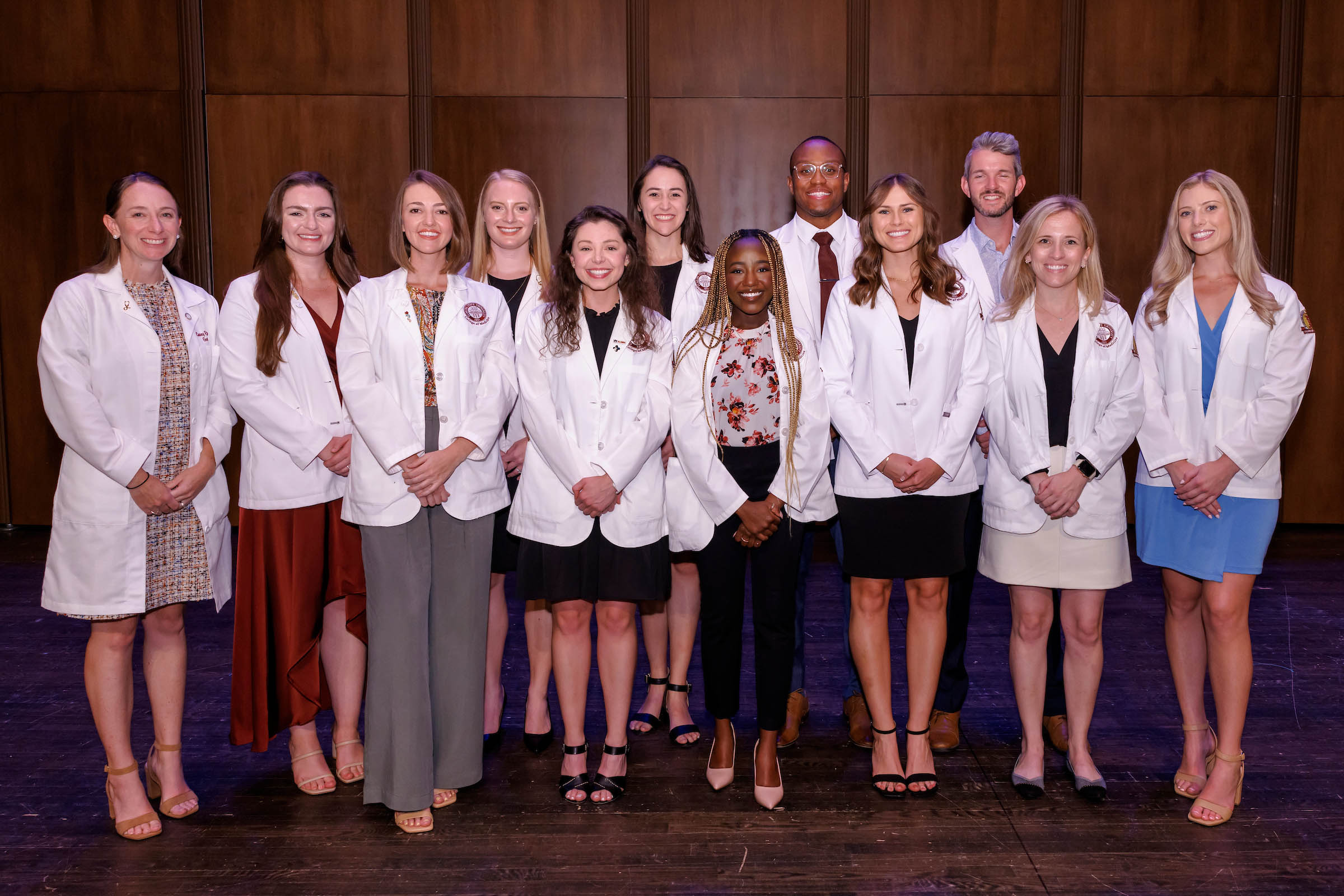 Dr. Casey Rust, far left, faculty advisor for GHHS and the 11 members of the Class of 2024 who were inducted.