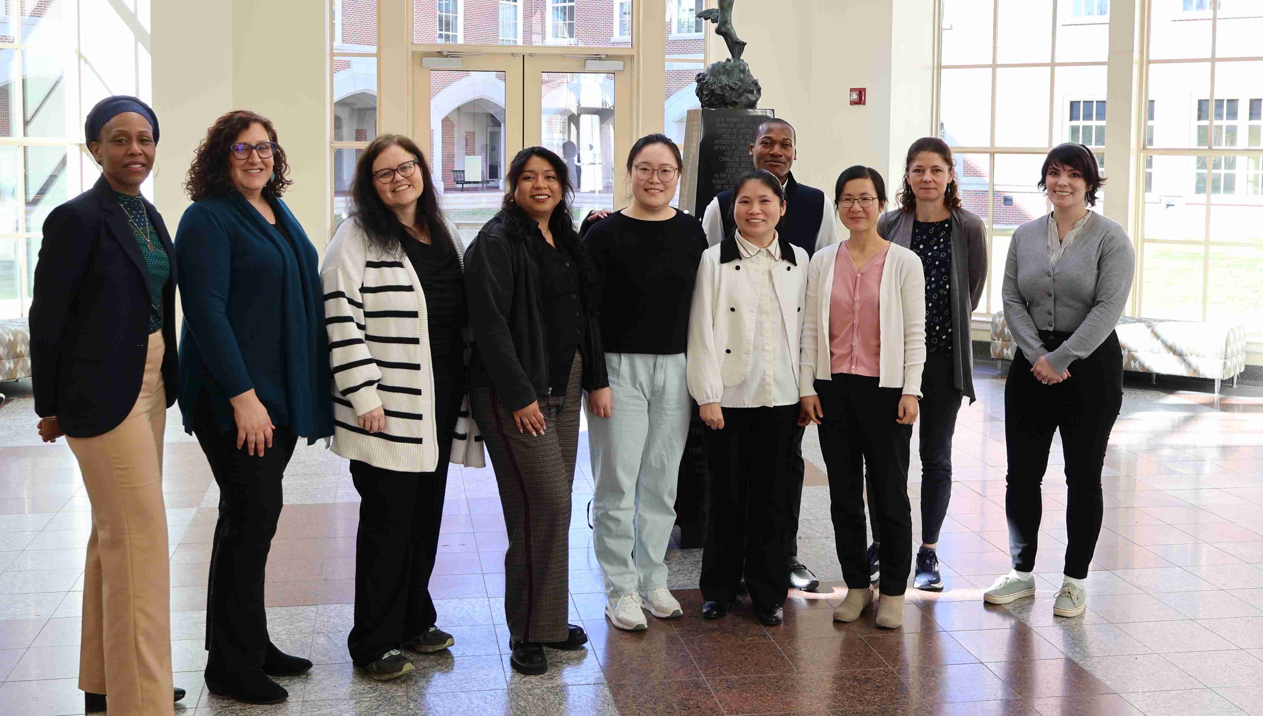 Group photo of IPRD team members including program directors, mentors, postdoctoral scholars, and a professional research assistant.