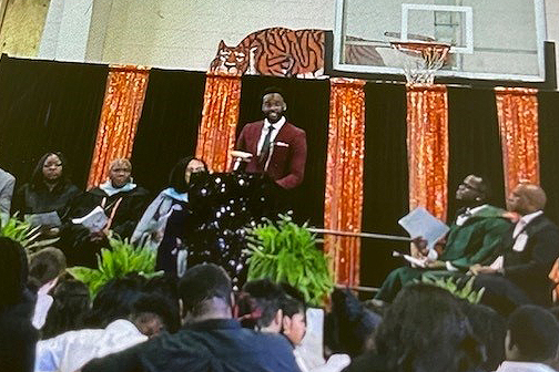 David Labassiere delivers the Progression Ceremony message at James A. Shanks Middle School in Quincy.