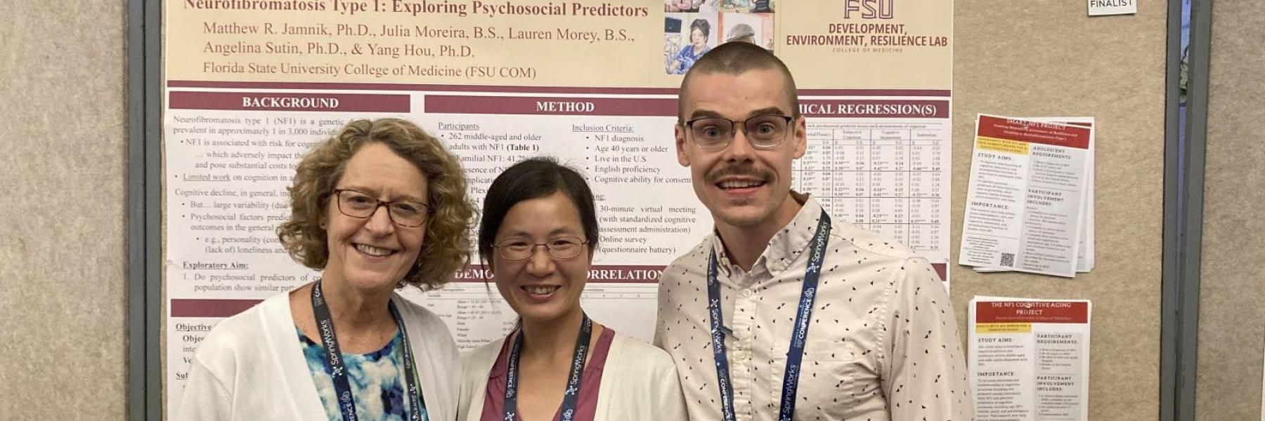 Assistant Professor Yang Hou, center, poses for a photo with one of her mentors, Pamela Wolters, Ph.D., and Matthew Jamnik, a post-doctoral scholar in Hou's lab.