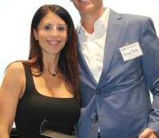 Melodie Mope standing next to Criag Yunk holding the 2026 Guardian of the Mission Award