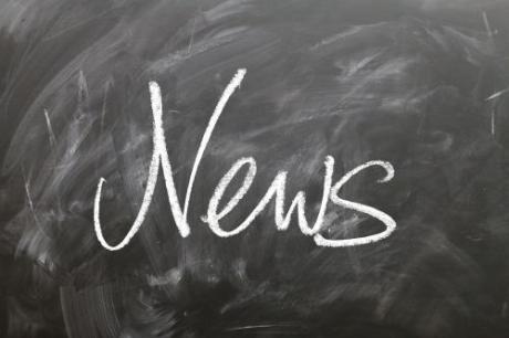 Blackboard with the word "News" hand-written in white chalk.
