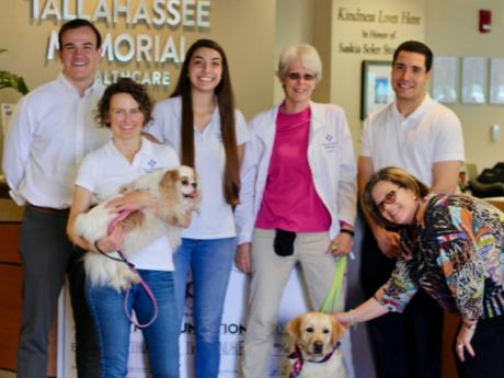 Med Students participating in animal therapy program