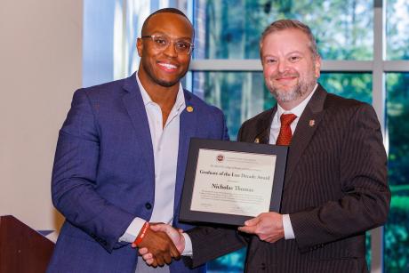 Nicholas Thomas and Health and Human Sciences interim dean Damon Andrew