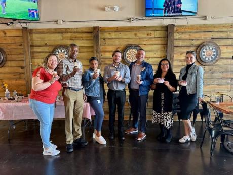 Group photo of the Spring 2026 Wellness Wednesday Brings Immokalee Campus Together. Everyone is standing together in-frame.