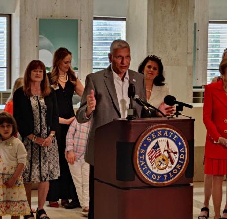 Pradeep Bhide speaking at the Florida State Capitol