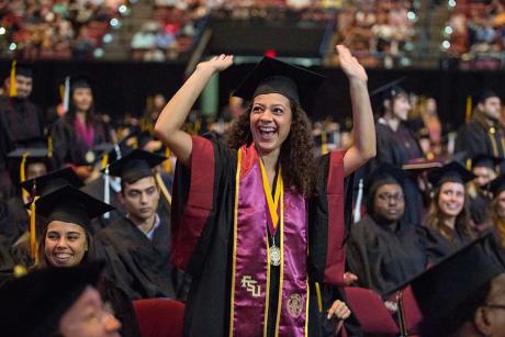 Photo of student with cap and gown