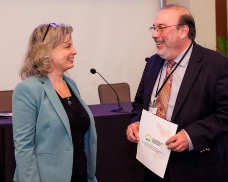 Heather Flynn, Ph.D., welcomes Robert Ammerman, Ph.D., one of the keynote speakers at the 8th Annual Florida Perinatal Mental Health Conference.