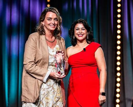 FSU Assistant Professor Megan Verdoni, MPAS, PA-C (left), and Dipu Patel, president-elect of the Physician Assistant Education Association, who presented the award.