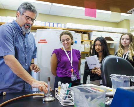 Akash Gunjan introduces students to research in his lab.