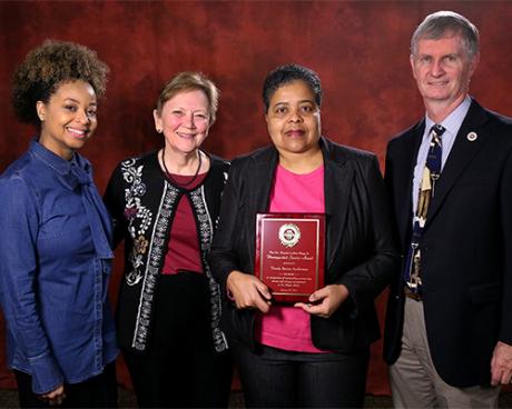 Joedrecka Brown Speights, Helen Livingston, Thesla Berne-Anderson and College of Medicine Dean John P. Fogarty