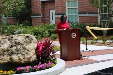 Interim Dean Alma Littles, M.D., speaks at garden dedication
