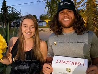 Jason Rivera on match day with his wife Kimberly Weikel.