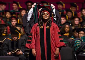 As Class of 2015 grads cross stage, number of alumni nears 1,000