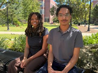 Chris Santana and Chenia Coulanges in the Chapman Wellness Garden