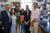 From left: Xian Jin Xie, senior associate dean for research and graduate programs; Yueling Hao, research assistant in the Julia Wang lab; Dr. Alma Littles, dean of the College of Medicine; Carson Mickey, graduate student in the Wang lab; Jyoti JC, research assistant in the Wang lab; Ryan Kiddle, graduate student in the Irianto lab; Hyeje Sumajit, graduate student in the Irianto lab; and Jerome Irianto, Ph.D., assistant professor of biomedical sciences.